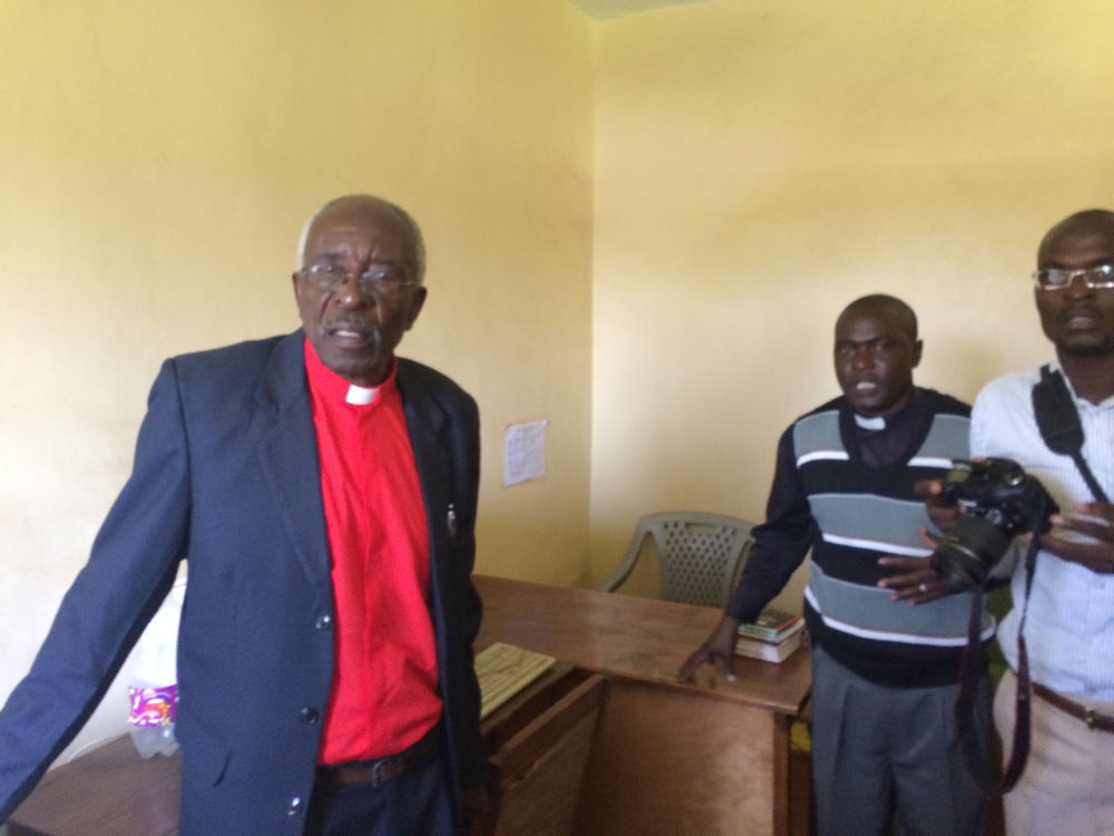 061-bishop_were__minister_and_photographer_at_church_hq.jpg